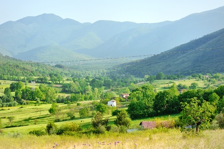 beautiful view of the Tuscan countryside with hills and meadow, Tuscany, Italyの写真素材