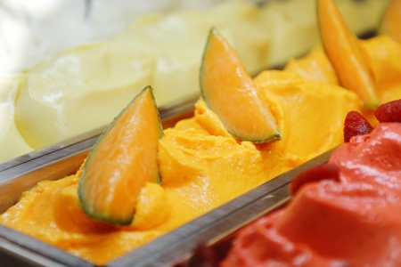 sweet cold tasty appetizing melon ice cream in metal basket
