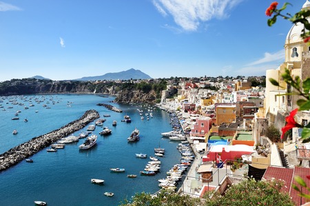 beautiful panoramic view of the colorful island of Procida in the Gulf of Naples, Mediterranean sea, Italyの写真素材