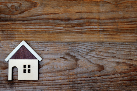 house on brown wood backgroundの写真素材