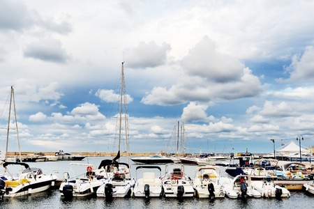 the sea and boats in the port of Ostuni, Apulia, Italy