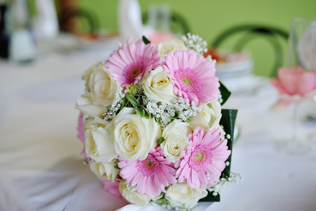 Wedding bouquet with white roses and pink gerberasの写真素材