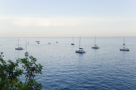 Scenic view of the sea and sail boatsの写真素材