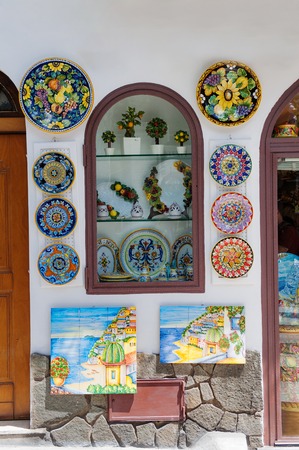 Souvenir shop with characteristic plates and paintings in Positano, Amalfi coast, Italy, Europeの写真素材
