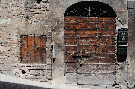 Ancient door in old town of Spello Umbria.Traditional italian medieval beautiful little town in Umbria region - central Italy.の写真素材