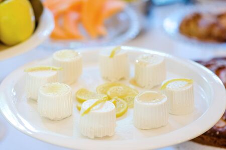 White little ricotta cheese on a plate - italian foodの写真素材