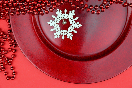 Red Christmas ornaments and wooden snowflakeの写真素材
