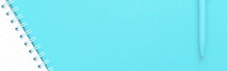 Assorted office and school pink and blue stationery on pastel trendy background in iridescent pencil case. Flat lay with copy space for back to school or education and craft conceptの写真素材