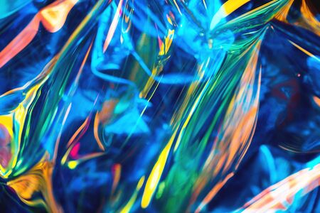 Abstract iridescent blue orange and blue fluid liquids reflections background with lens flare soft...
