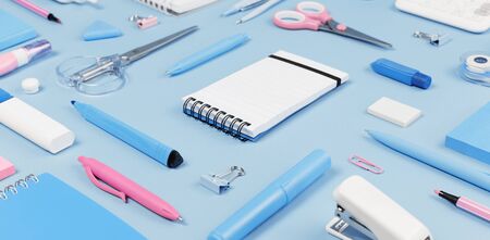 Assorted office and school pink white and blue stationery on pastel background as border. Top view...