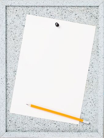 Mockup. Blank paper page on grey cork notice board with yellow pencil. Copy space. Advert or reminder template. Opening or closing hours.の写真素材