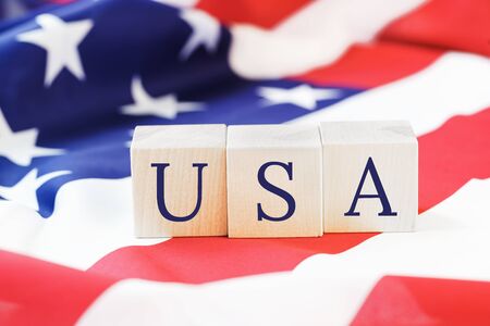 USA text on US American flag. Happy Independence Day. Stars and stripes. Copy space.の写真素材