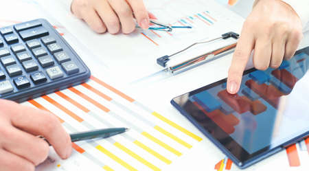 Finance and business concept. Female small business. people pointing at statistics data chart...