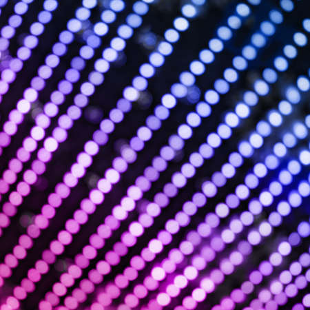 Colorful background with natural bokeh texture and defocused sparkling lights pattern. Blue and pink...
