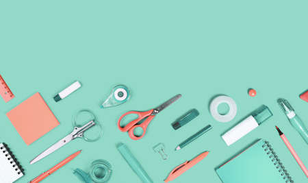 Assorted office and school white orange and green stationery supply on pastel trendy background as knolling. Copy space. Flat lay for back to school or education and craft concept.の写真素材