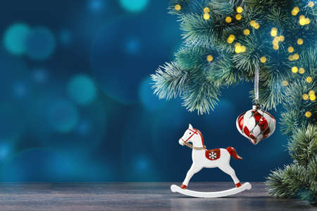 Christmas ornaments and gifts on green with snowの写真素材