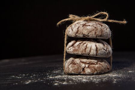 Chocolate chip cookies on black background, sweet dessert, selective focus, close upの写真素材