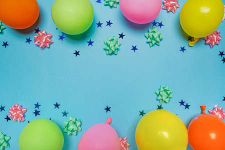 Flat lay decoration party concept on pastel blue background top view copy spaceの写真素材