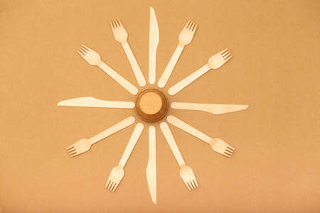 Zero waste background, disposable paper cup, forks and knives. Save the planet concept