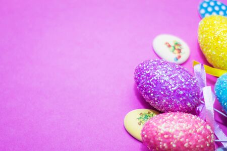 on a pink background close-up of colored Easter eggs, holidayの写真素材