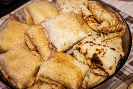 Appetite, delicious pancakes on a plate close-up. Carnival Festival.の写真素材
