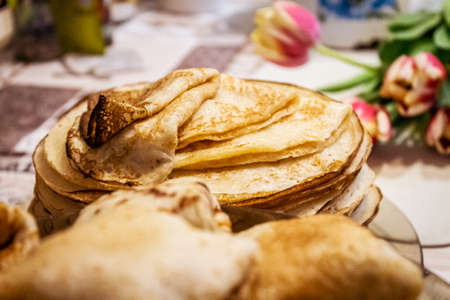 Appetite, delicious pancakes on a plate close-up. Carnival Festival.の写真素材