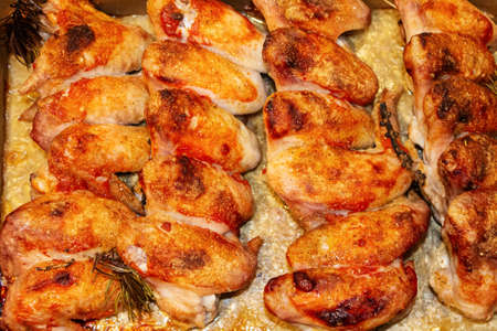 Juicy chicken wings with a crispy crust close-up. Cooked in the oven.の写真素材
