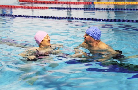 Middle Aged happy Couple In Swimming Poolの写真素材