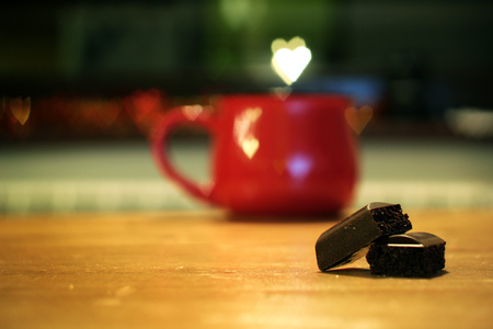 Valentines day concept with cup and hearts overの写真素材