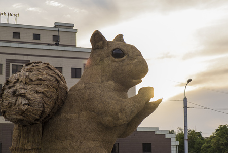 Almaty, Kazakhstan - July 15, 2018: The huge squirrel made of hay in Atakent square.のeditorial素材