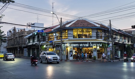 BANGKOK, THAILAND - February 01, 2019 - beautiful cafe and people, cars in the street in the eveningのeditorial素材