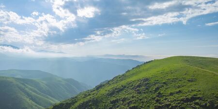 Amazing summer landscape, view to the green hills and beautiful sky