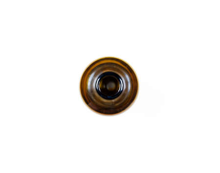 Beer bottle from above on white background.