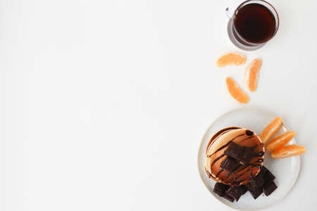 pancakes with chocolate on a white backgroundの写真素材