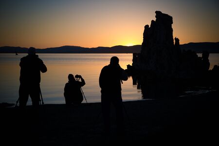 photographers photographing the tufas at mono lake at sunriseの写真素材