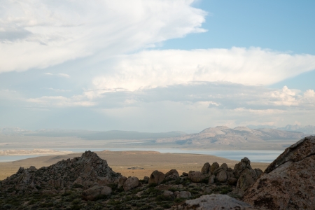 Rocky hillside and clouds above mono lake in horizontal orientationの写真素材