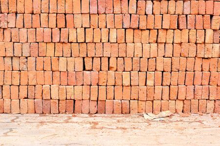 Heap of red brick on walkway
