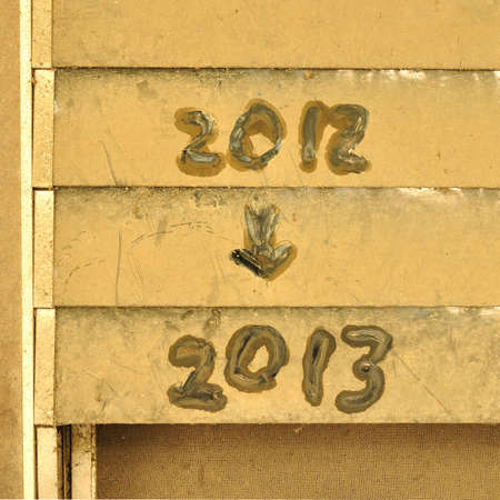 2012 to 2013 on dirty louver windowの写真素材