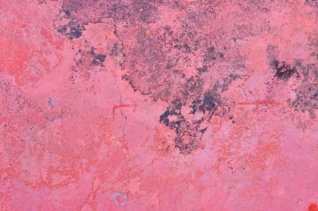 Grunge red cement wall for texture backgroundの写真素材