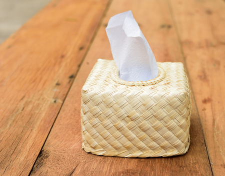 Box of tissue on a wood tableの写真素材