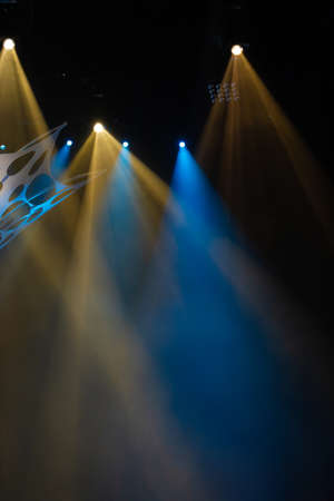scene, stage light with colored spotlights and smoke