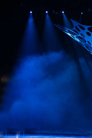 scene, stage light with colored spotlights and smokeの写真素材