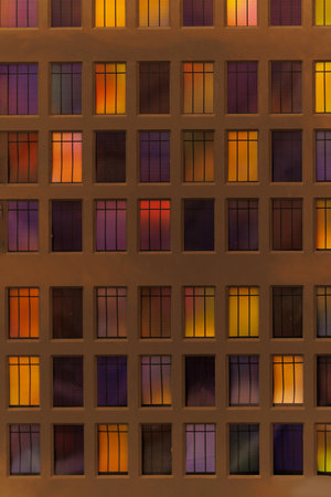 Background for design. New Year's decorations, toys and garlands on the windows in fabulous scenery. Houses for children in a public place.の写真素材