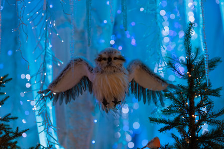 New Year's decorations, toys and garlands in fabulous settings. Toy animals for children in a public...