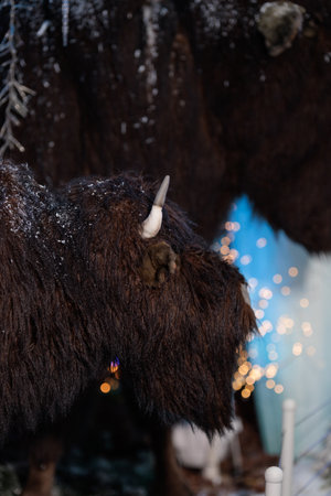 New Year's decorations, toys and garlands in fabulous settings. Toy animals for children in a public place.の写真素材