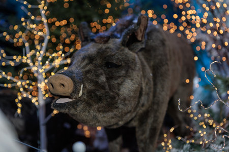 New Year's decorations, toys and garlands in fabulous settings. Toy animals for children in a public...