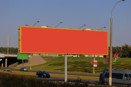 Background for design. Advertising billboard along the road in the city on an autumn sunny eveningの写真素材