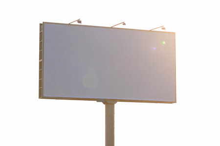 Background for design. Advertising billboard along the road in the city on an autumn sunny eveningの写真素材