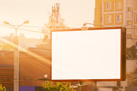 Background for design. Advertising billboard along the road in the city on an autumn sunny eveningの写真素材