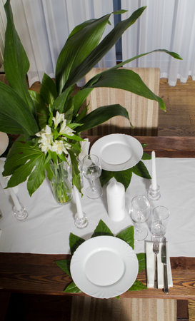 Festive table decorations, flowers and tableware, beautiful table setting for guests